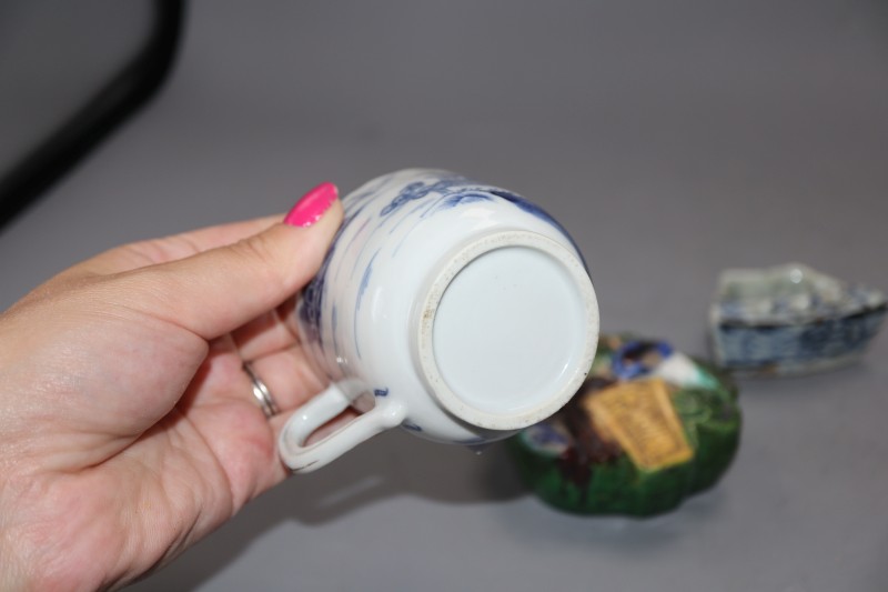 A group of Chinese porcelain including a Redware teapot, a blue and white tea cup and two other pieces